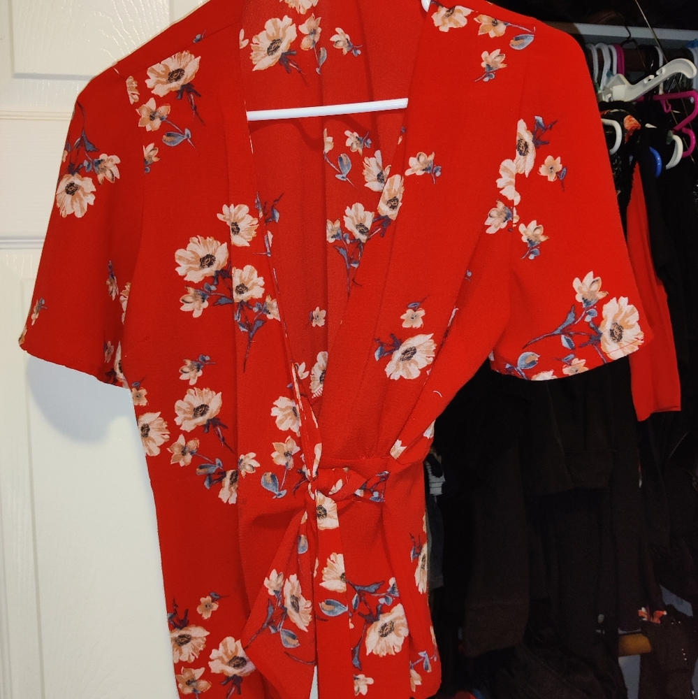 Red floral tie wrap blouse